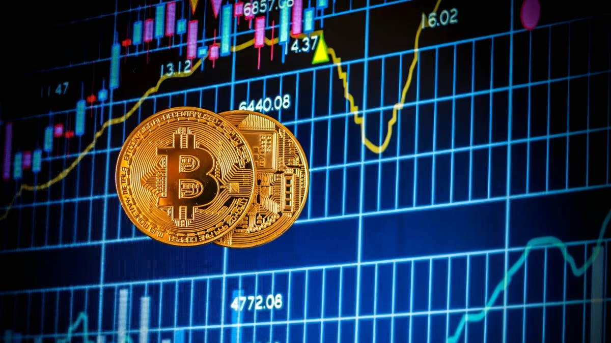 Bitcoin beside a market chart